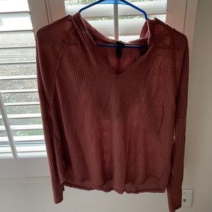 Hooded long sleeved shirt